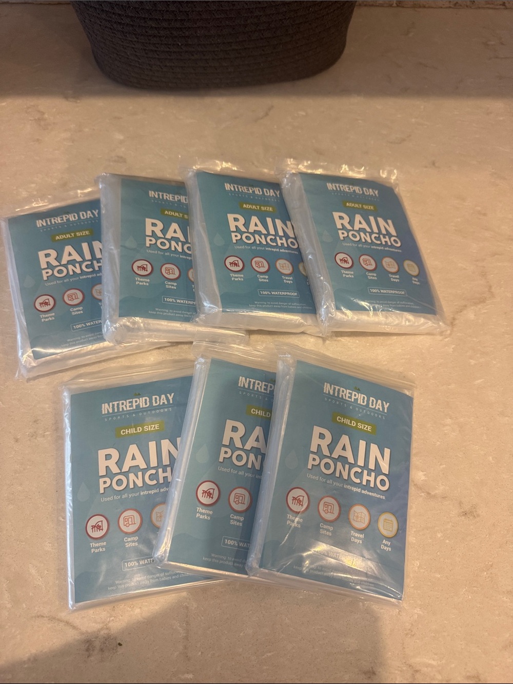 Family Pack of Disposable Rain Ponchos 4 adult ponchos & 3 Child Size